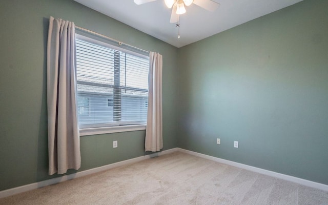 1201 Grove Blvd Unit 702, Austin, TX 78741 - carpeted spare room with ceiling fan and baseboards