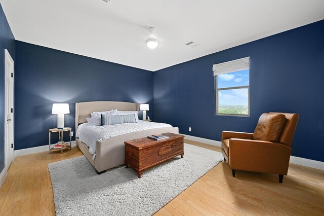 7721 Journeyville Dr, Austin, TX 78735 - bedroom with baseboards and light wood-style flooring