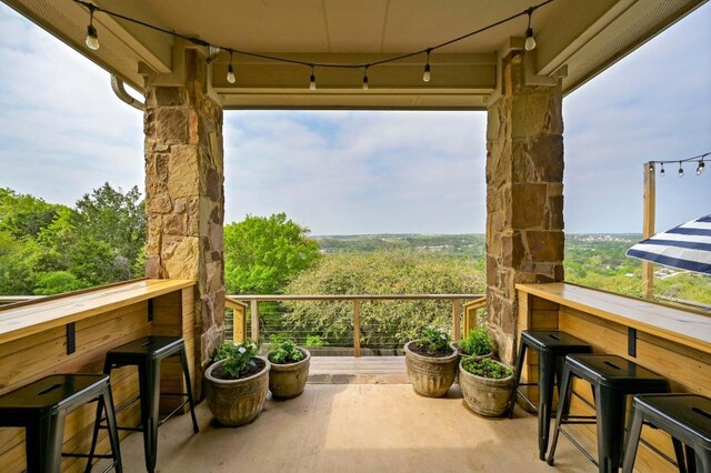 7721 Journeyville Dr, Austin, TX 78735 - balcony featuring a wooded view