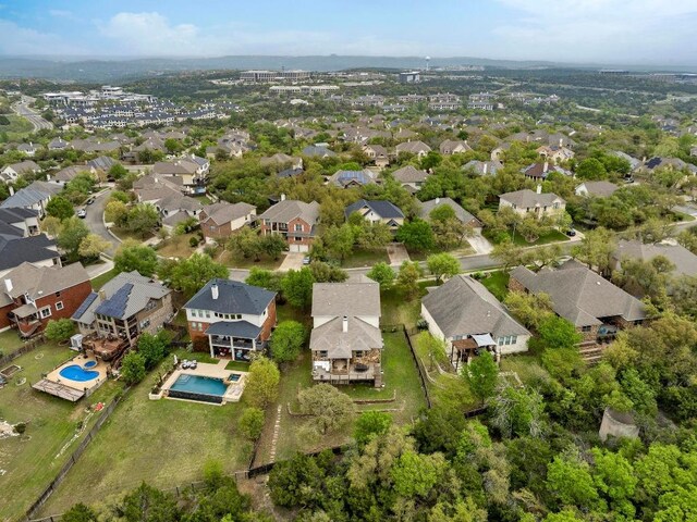 7721 Journeyville Dr, Austin, TX 78735 - aerial perspective of suburban area with a pool