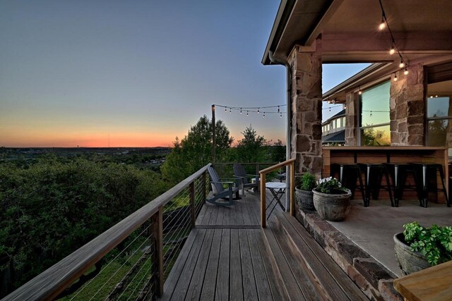 7721 Journeyville Dr, Austin, TX 78735 - view of deck at dusk