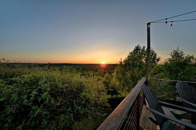 7721 Journeyville Dr, Austin, TX 78735 - view of balcony at dusk