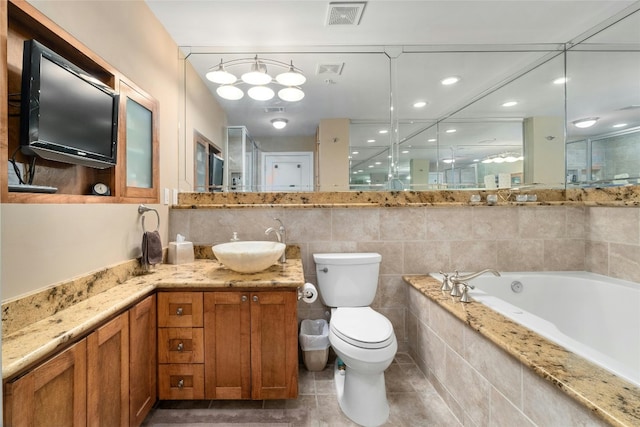 360 Nueces St Unit 3504, Austin, TX 78701 - full bath with toilet, a garden tub, and vanity