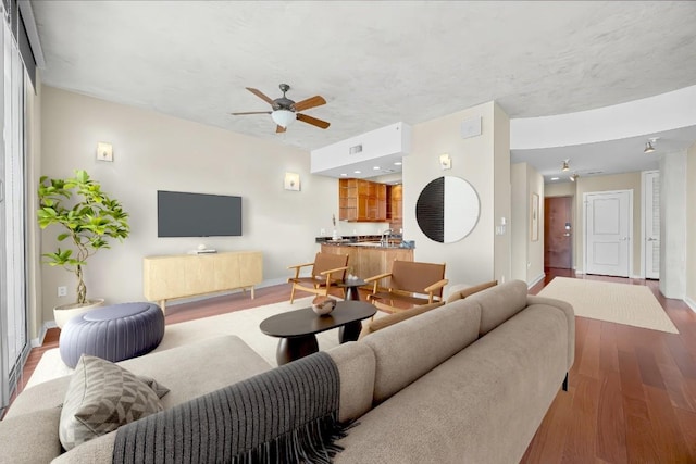 360 Nueces St Unit 3504, Austin, TX 78701 - living room with wood finished floors, a ceiling fan, and baseboards