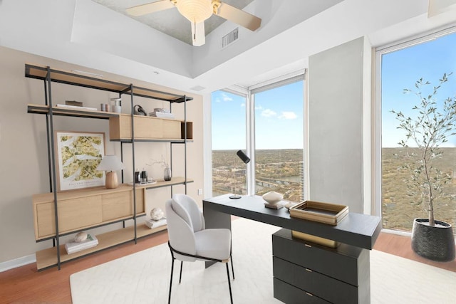 360 Nueces St Unit 3504, Austin, TX 78701 - office space with wood finished floors and a ceiling fan