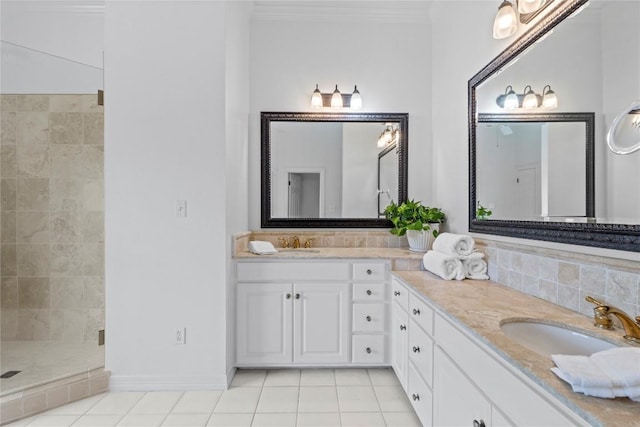 5305 Cuesta Verde, Austin, TX 78746 - bathroom with tile patterned flooring, double vanity, crown molding, and tiled shower
