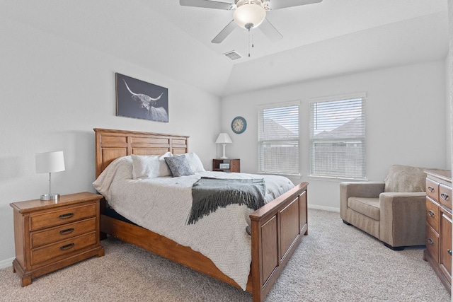 bedroom featuring vaulted ceiling, baseboards, light colored carpet, visible vents, and ceiling fan
