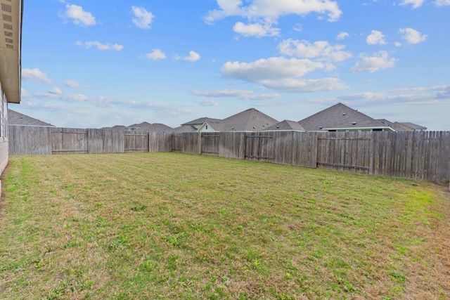 view of yard featuring a fenced backyard