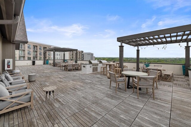 4501 Jackson Ave Unit 5205, Austin, TX 78731 - wooden terrace with outdoor dining area and a pergola