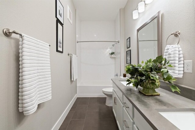 4501 Jackson Ave Unit 5205, Austin, TX 78731 - bathroom with double vanity, toilet, tile patterned floors, tub / shower combination, and baseboards