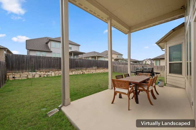 view of patio with a fenced backyard, a grill, outdoor dining space, and a residential view