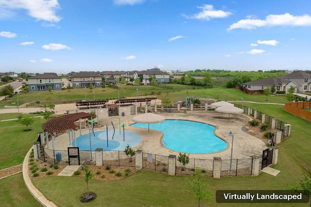 community pool with fence, a pergola, and a yard