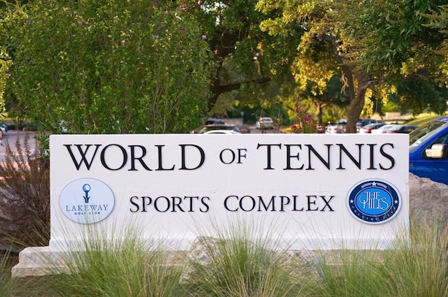 16 Tournament Way Unit 19, The Hills, TX 78738 - view of community / neighborhood sign
