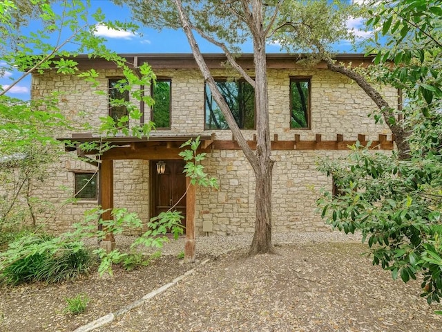 view of front of home with stone siding