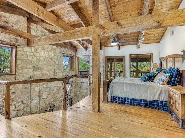 bedroom featuring wood ceiling, visible vents, hardwood / wood-style flooring, and vaulted ceiling with beams