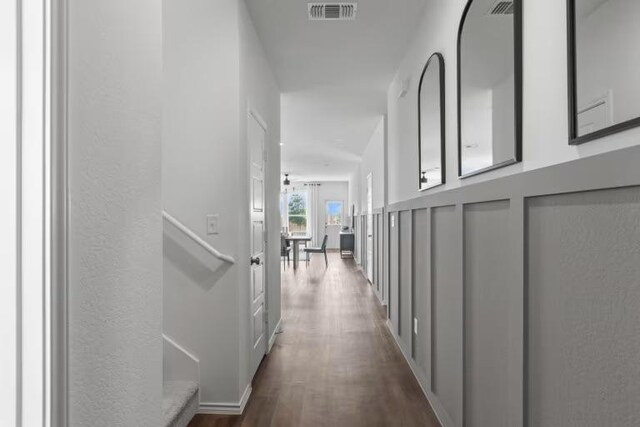 13312 Lapoynor St, Manor, TX 78653 - hall featuring dark wood-style floors and baseboards