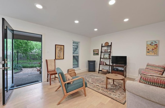 5820 Berkman Dr Unit 119, Austin, TX 78723 - living area featuring light wood-style floors, recessed lighting, and baseboards