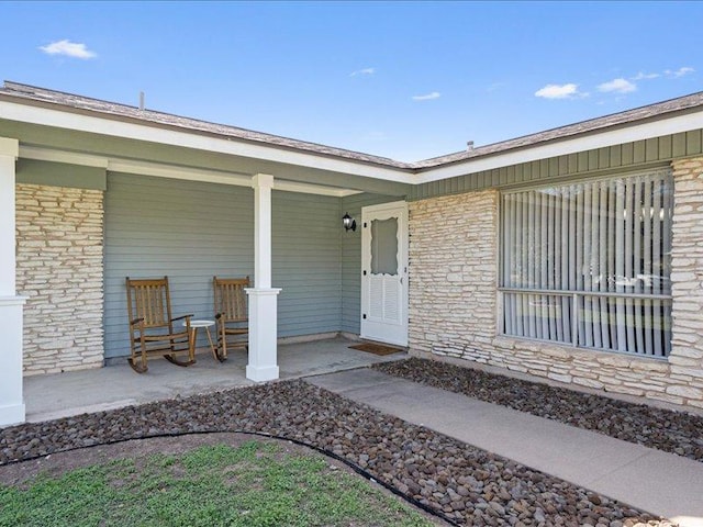 entrance to property with a porch