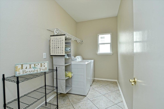 202 Whippoorwill Cv, Georgetown, TX 78633 - laundry area featuring independent washer and dryer, baseboards, and tile patterned floors