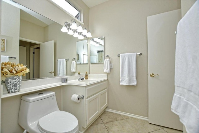 202 Whippoorwill Cv, Georgetown, TX 78633 - bathroom featuring vanity, tile patterned floors, baseboards, and toilet