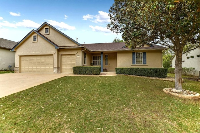 202 Whippoorwill Cv, Georgetown, TX 78633 - view of front of property with concrete driveway, a garage, a front lawn, and stucco siding