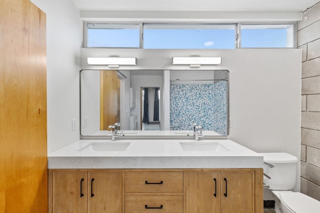 4801 S Congress Ave Unit H2, Austin, TX 78745 - bathroom featuring double vanity and curtained shower