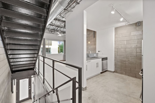 4801 S Congress Ave Unit H2, Austin, TX 78745 - stairs with finished concrete floors and rail lighting