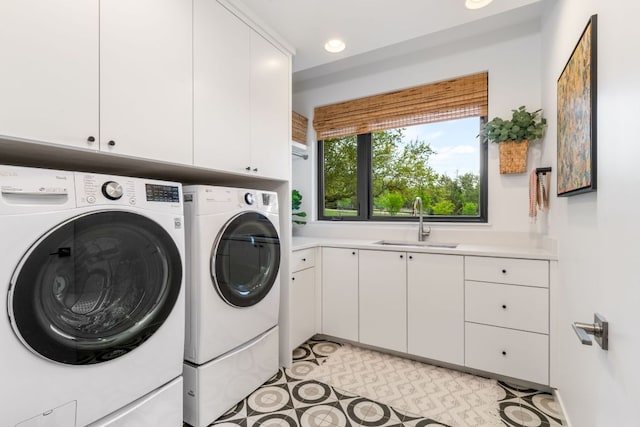 3931 R O Dr, Spicewood, TX 78669 - washroom with cabinet space, washer and dryer, and recessed lighting