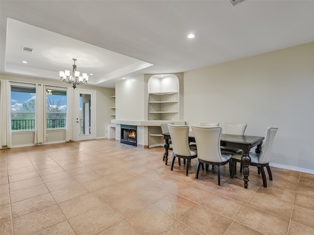 539 Colovista Pkwy Unit C103, Bastrop, TX 78602 - dining area with built in shelves, a chandelier, light tile patterned floors, baseboards, and recessed lighting