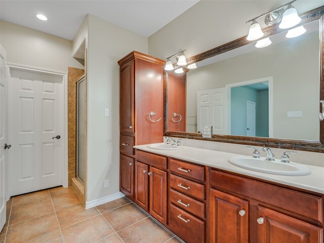 539 Colovista Pkwy Unit C103, Bastrop, TX 78602 - full bath with double vanity, tile patterned floors, and a stall shower