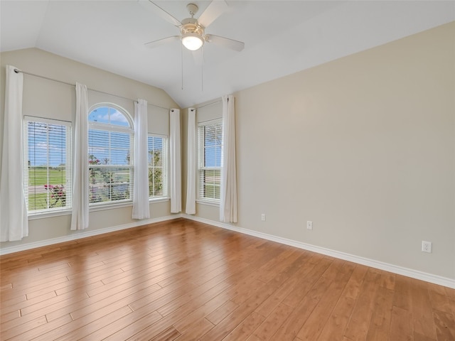 539 Colovista Pkwy Unit C103, Bastrop, TX 78602 - unfurnished room featuring lofted ceiling, a ceiling fan, baseboards, and light wood-style flooring