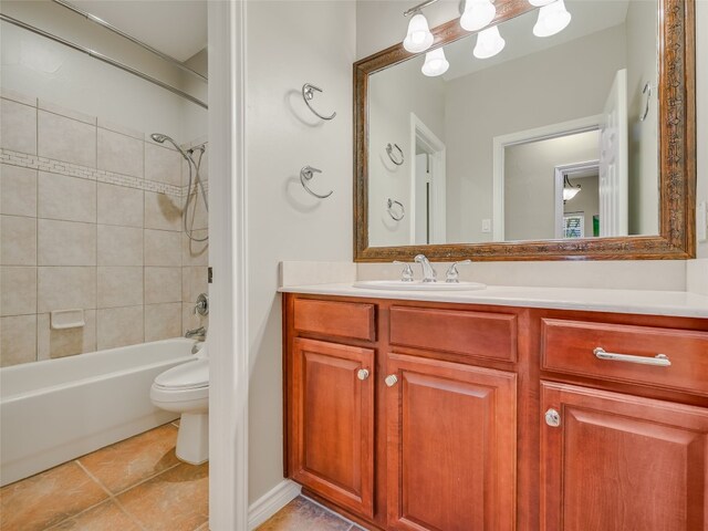 539 Colovista Pkwy Unit C103, Bastrop, TX 78602 - bathroom featuring toilet, vanity, bathing tub / shower combination, and tile patterned flooring