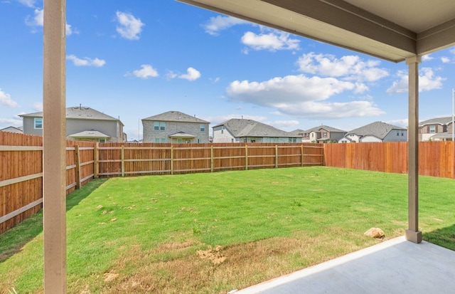 16824 Santiaguillo Trce, Manor, TX 78653 - fenced backyard with a residential view and a patio