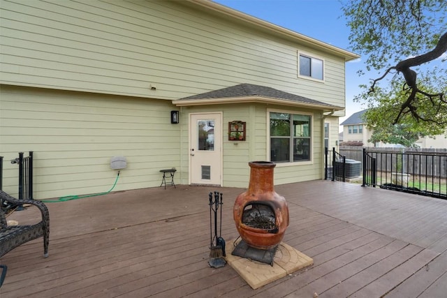 4932 Woodstock Dr, Georgetown, TX 78633 - wooden deck with a fire pit