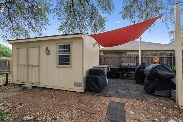 4932 Woodstock Dr, Georgetown, TX 78633 - view of shed with a fenced backyard