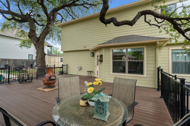 4932 Woodstock Dr, Georgetown, TX 78633 - deck featuring outdoor dining area and an outdoor fire pit
