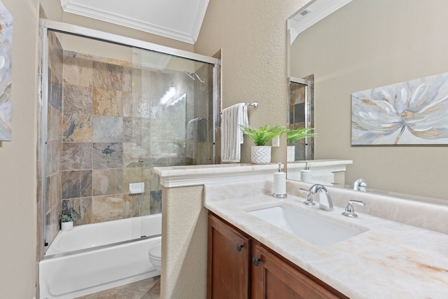 3985 Sapphire Loop, Round Rock, TX 78681 - full bath with shower / bath combination with glass door, vanity, toilet, ornamental molding, and a textured wall