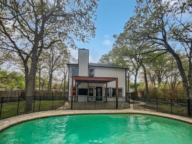 view of pool featuring fence and a fenced in pool