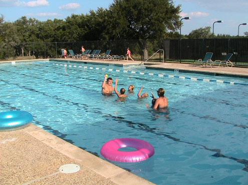 30105 Meadow Greens Dr, Georgetown, TX 78628 - community pool featuring a patio area