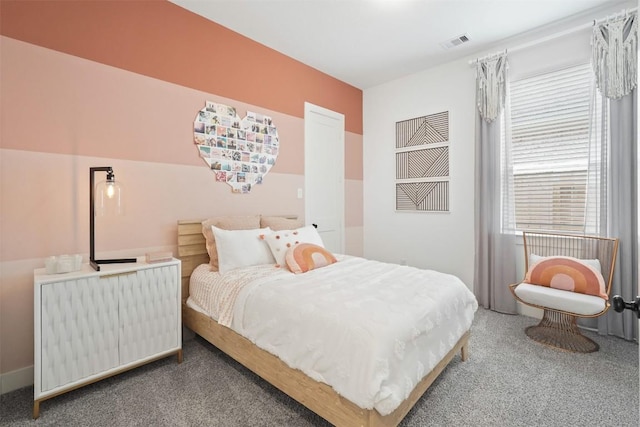 523 Jane Long, San Marcos, TX 78666 - bedroom with radiator heating unit and carpet flooring
