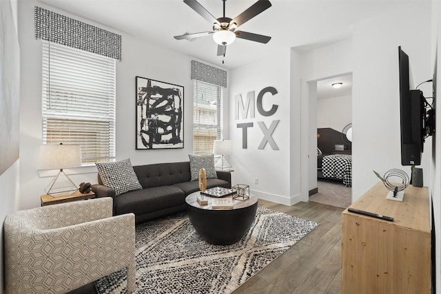 523 Jane Long, San Marcos, TX 78666 - living room with a ceiling fan, wood finished floors, and baseboards