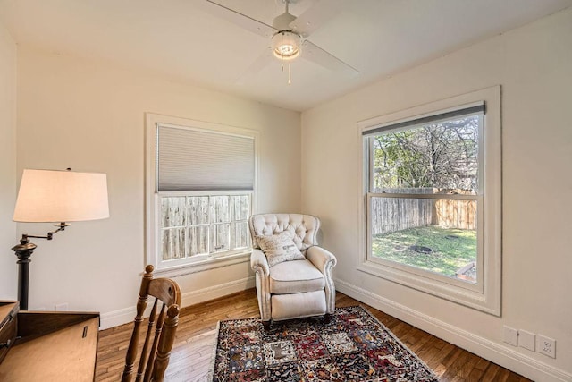 811 E 45th St, Austin, TX 78751 - sitting room with baseboards, ceiling fan, and wood finished floors
