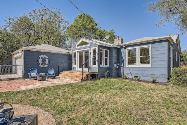 811 E 45th St, Austin, TX 78751 - back of property featuring entry steps, a patio, a garage, an outdoor structure, and crawl space