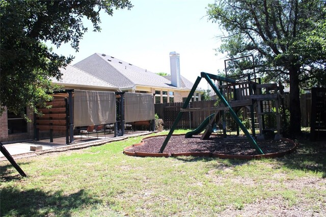 2718 Sun Mountain Dr, Leander, TX 78641 - view of yard featuring a playground and a patio area