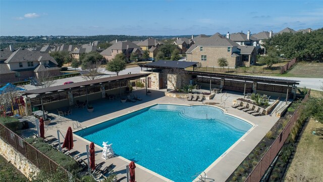 17100 Yellowstar Dr, Austin, TX 78738 - community pool featuring a residential view and a fenced backyard