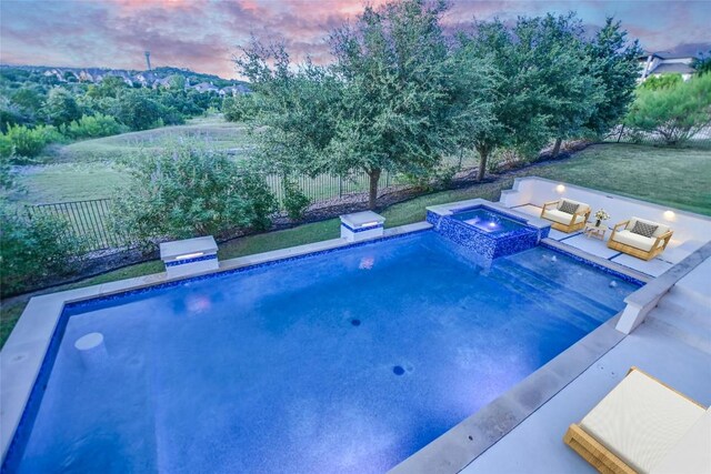 17100 Yellowstar Dr, Austin, TX 78738 - pool at dusk featuring a pool with connected hot tub
