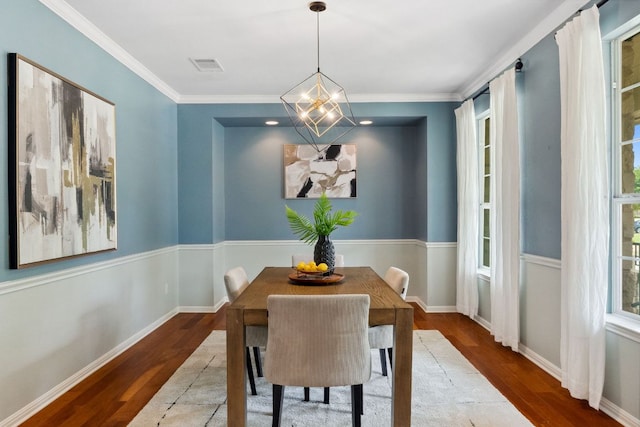 10408 Medinah Greens Dr, Austin, TX 78717 - dining room featuring wood finished floors, crown molding, and baseboards