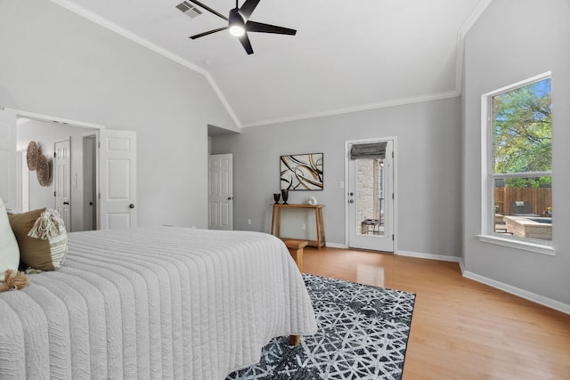 10408 Medinah Greens Dr, Austin, TX 78717 - bedroom featuring multiple windows, light wood-type flooring, crown molding, baseboards, and lofted ceiling