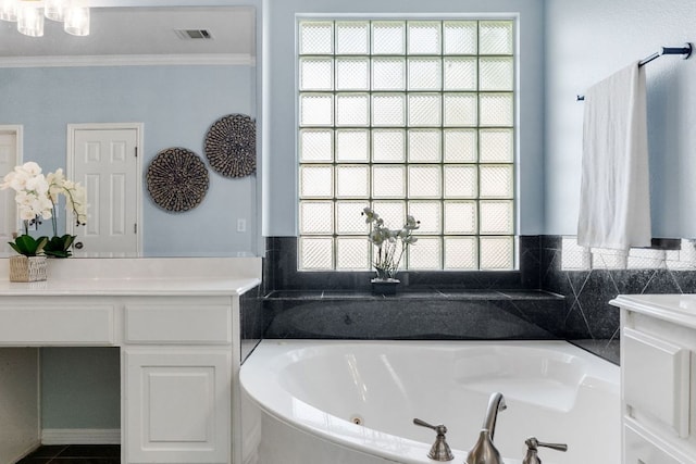 10408 Medinah Greens Dr, Austin, TX 78717 - full bathroom with vanity, a whirlpool tub, and ornamental molding