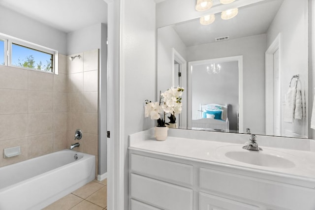 10408 Medinah Greens Dr, Austin, TX 78717 - full bath with tile patterned floors, vanity, shower / tub combination, a chandelier, and ensuite bathroom